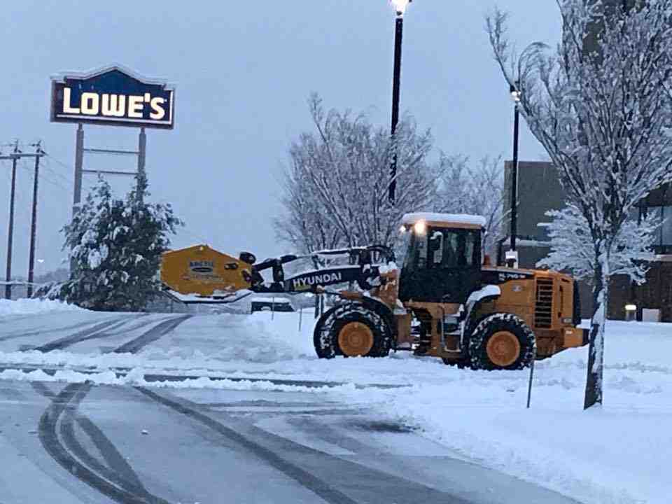 McLeod Landscaping Snow Problem! Mastering Parking Lot Snow Removal Costs and Strategies